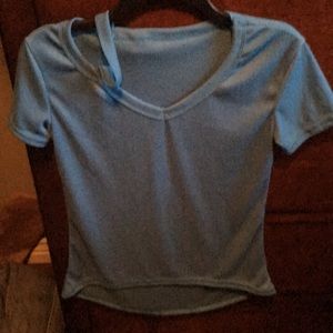 Bright turquoise tee with shoulder strap